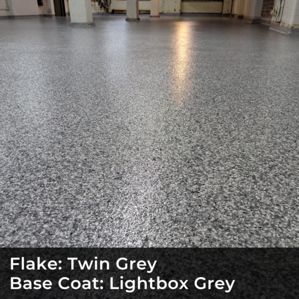 Flake epoxy flooring garage with glossy finish